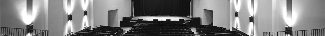 Black and white header image of the inside of The Newton Theatre.