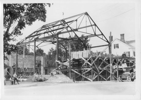 Historic photo showing the steel frame of The NewtonTheatre.