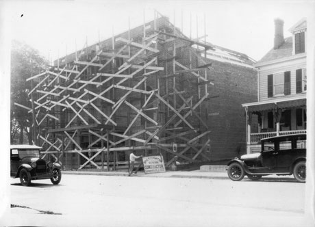 Historic photo showing nearly finished construction of The Newton Theatre.